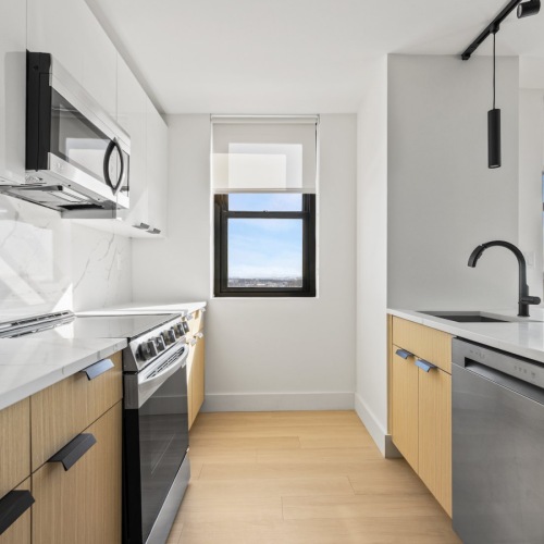 Well-lit kitchen with ample counter space